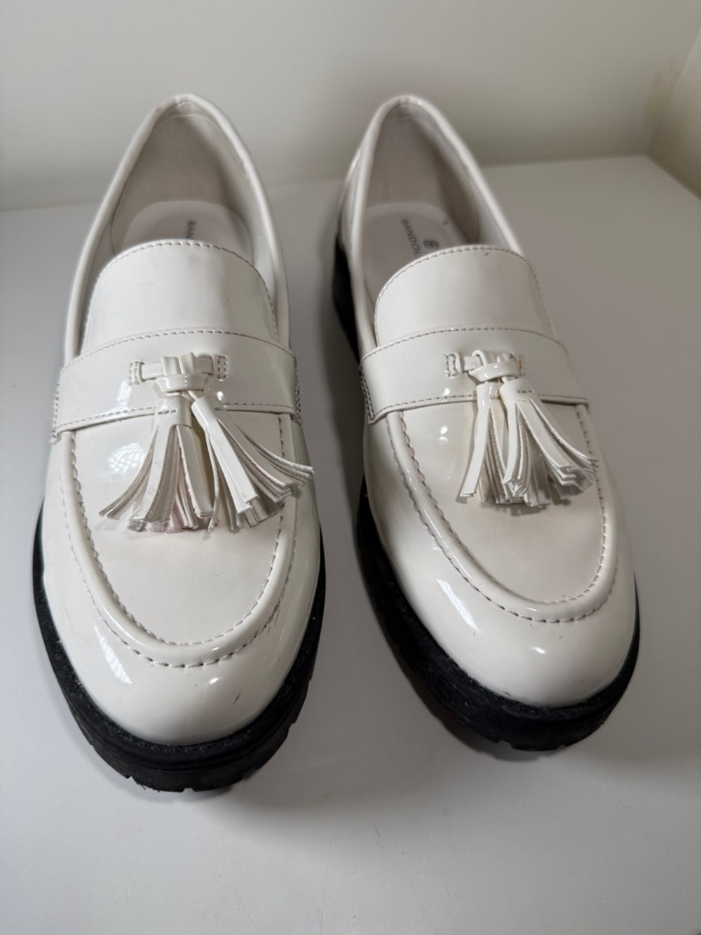 Bandolino White Patent Tassel Loafers with Black Sole